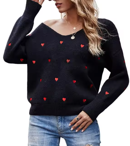 Donna indossa maglione a V con cuori, perfetto per outfit casual chic e calore autunno inverno.