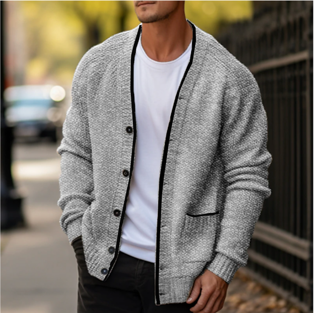 Cardigan da uomo elegante con bottoni, scollo a V e tasca, maglia perfetta per un look casual o raffinato.