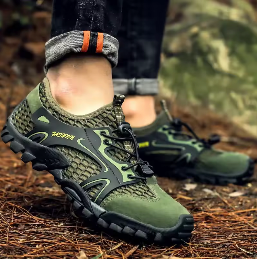 Scarpe uomo da montagna, design sportivo per trekking, con ottima aderenza antiscivolo su qualsiasi sentiero.