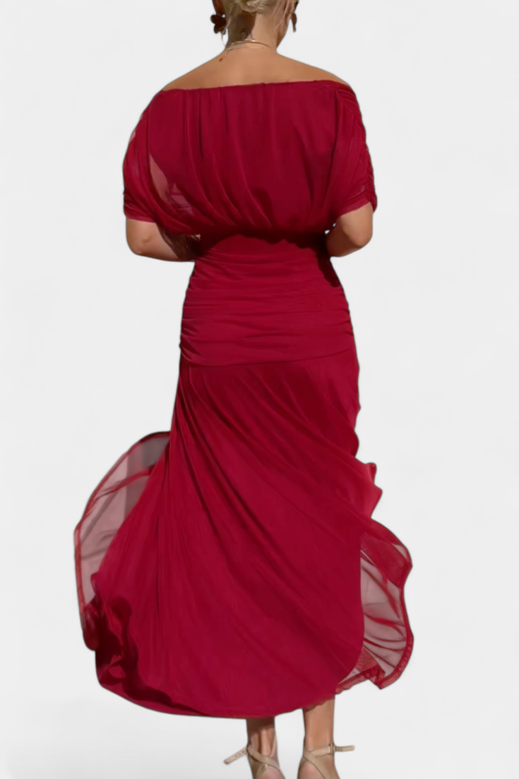 Abito lungo estivo donna con stampa floreale e scollo a V. Un capo fluido per la moda femminile.