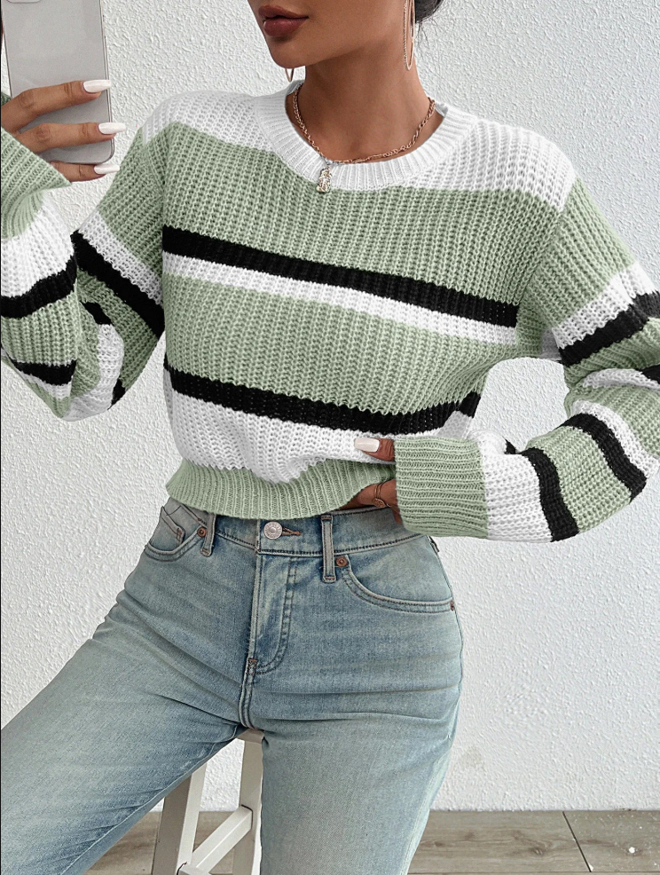 Maglione donna a righe, un must-have per un look casual e confortevole. Perfetto per il tuo stile moderno.