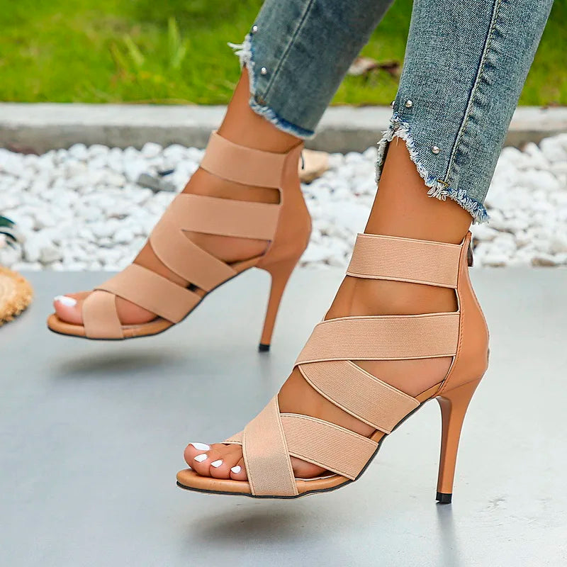 Scarpe da donna con tacco a spillo e fasce incrociate, dotate di pratica cerniera posteriore per comfort e stile.