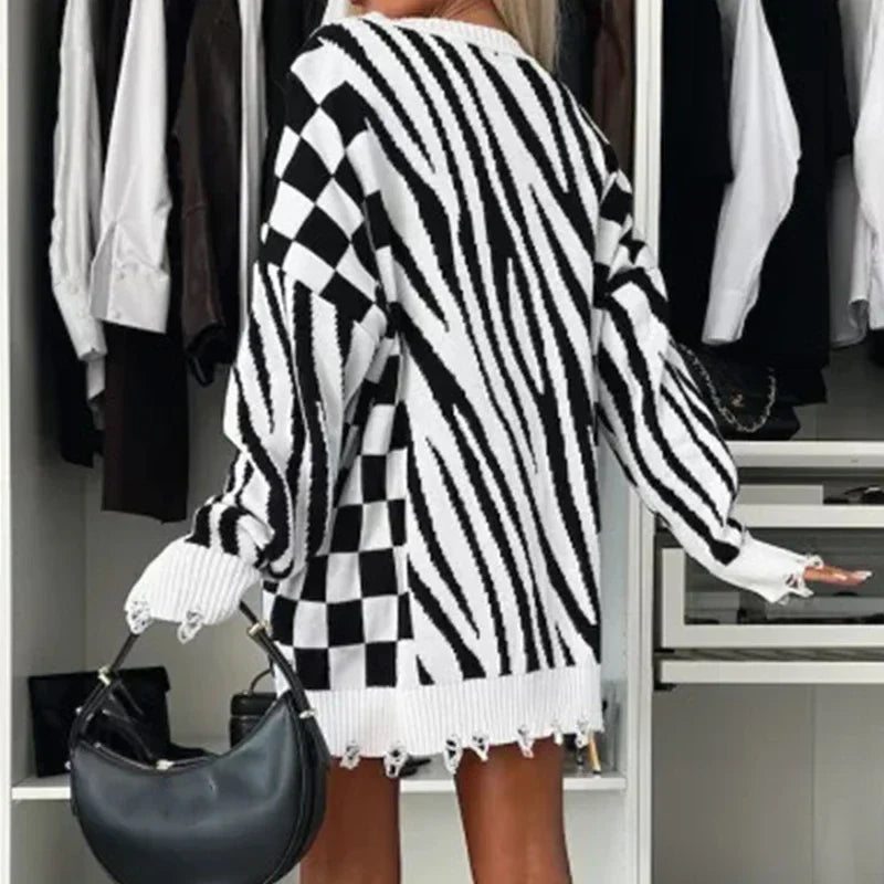 Maglione donna autunnale/invernale con stampa zebrata. Comodo, elegante e ideale per look casual.