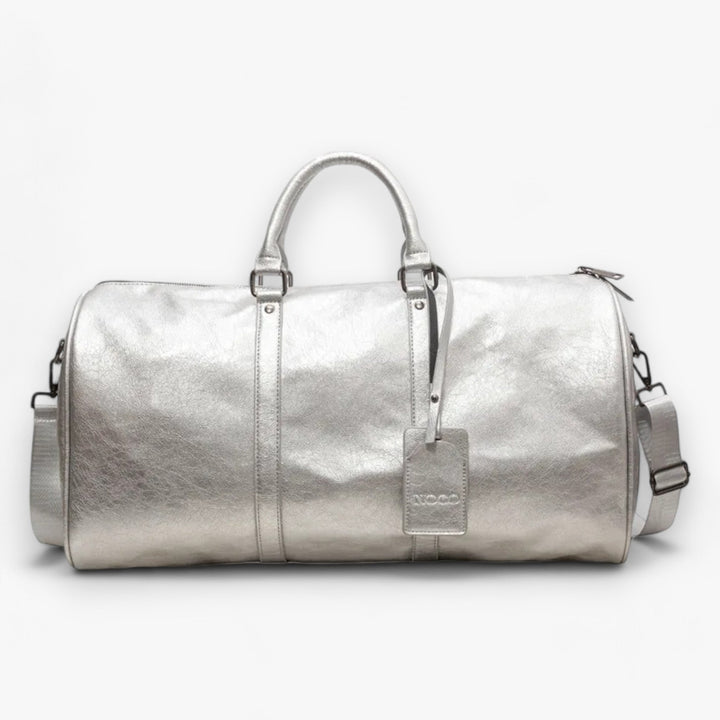 Borsone da viaggio donna nero elegante, con tracolla regolabile, il compagno ideale per il tuo viaggio.