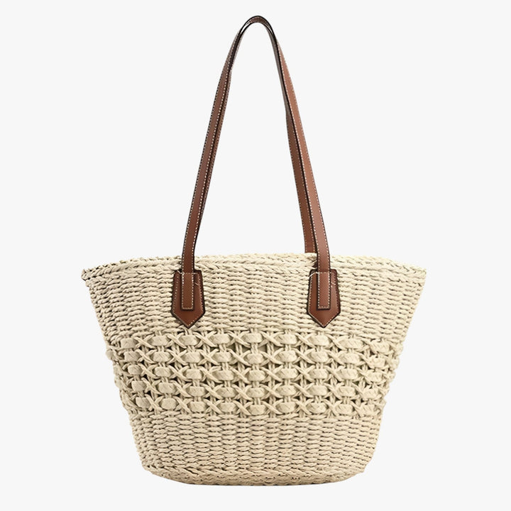 Borsa tote in paglia artigianale da donna, perfetta per un look estivo chic e alla moda.