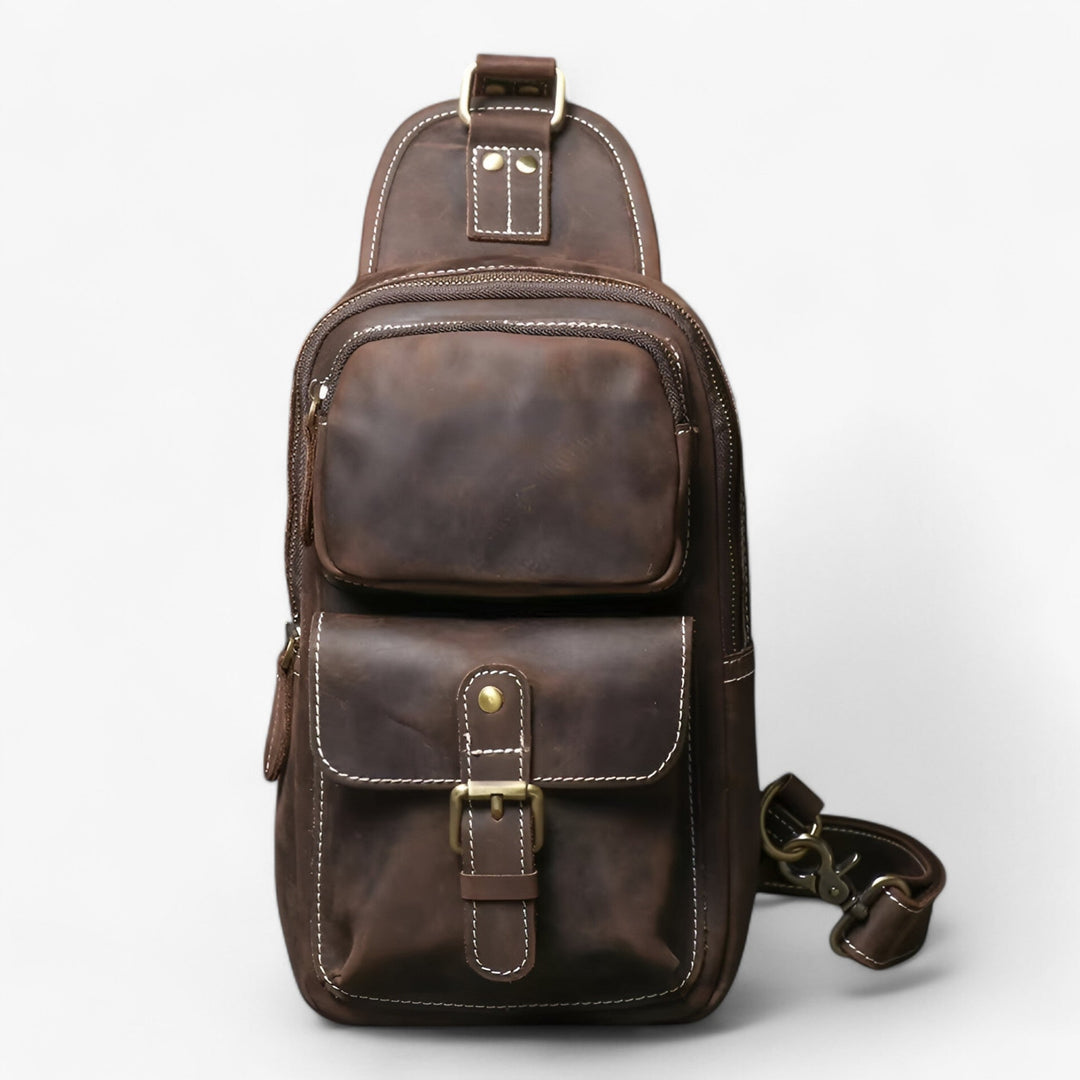 Accessorio maschile quotidiano: borsa monospalla uomo nera, robusta e multiscomparto, per un trasporto organizzato.