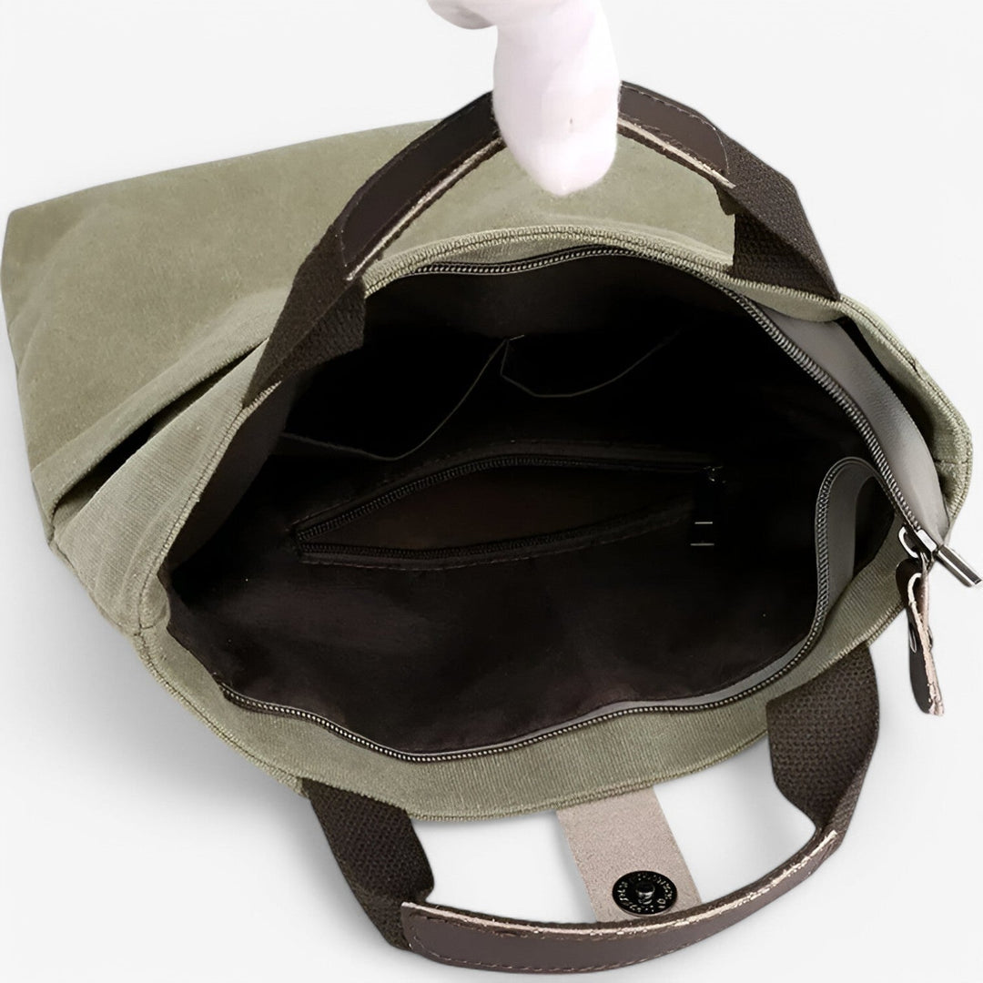 Robusta borsa messenger uomo verde militare, con ampi scomparti per viaggio e quotidianità.