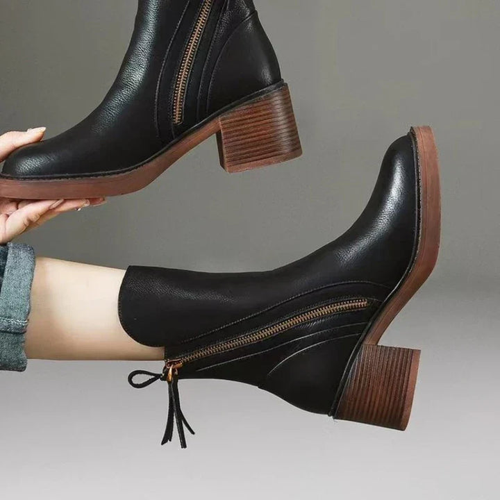 Stivaletti donna con tacco alto, suola antiscivolo robusta per aderenza e comfort invernale. Scarpe eleganti.