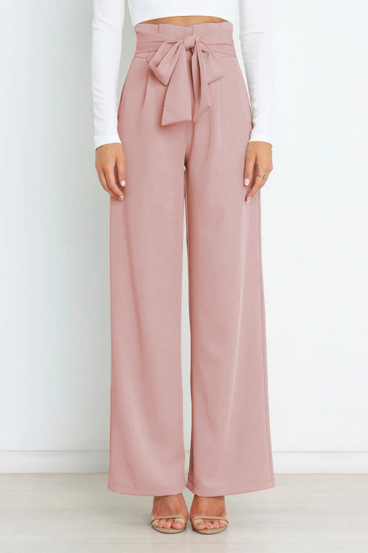 Pantaloni donna versatili a vita alta e gamba larga, con cintura. Adatti per ogni stagione.