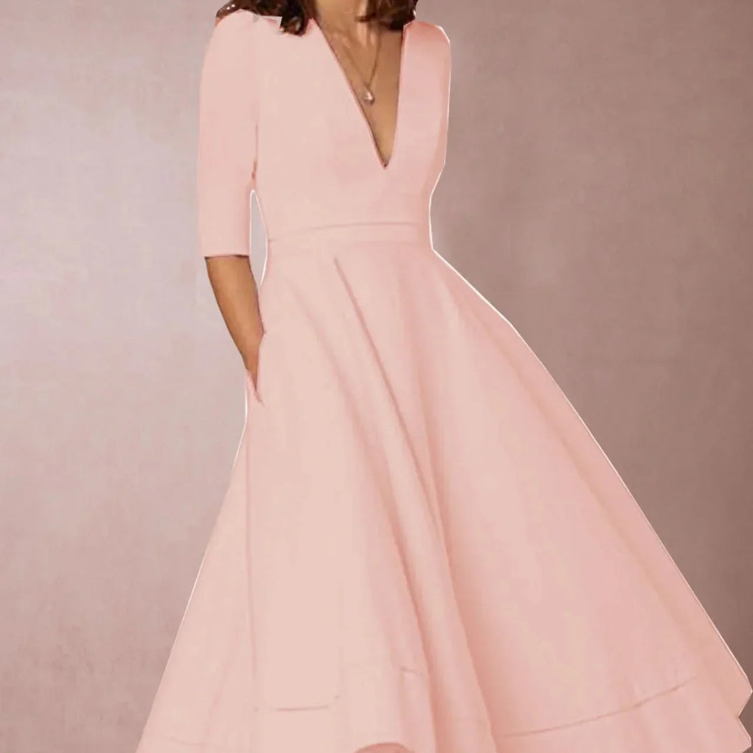 Abito donna ispirato agli anni '60, A-line vintage con gonna svasata. Per un look retrò primaverile ed elegante.