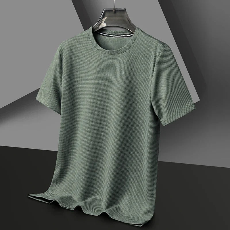 Maglietta casual uomo in rete traspirante a nido d'ape. Perfetta per l'estate e il comfort quotidiano.