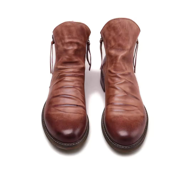 Stivaletti Chelsea uomo arancio, stile versatile. Scarpe invernali casual per moda maschile e calzata facile.