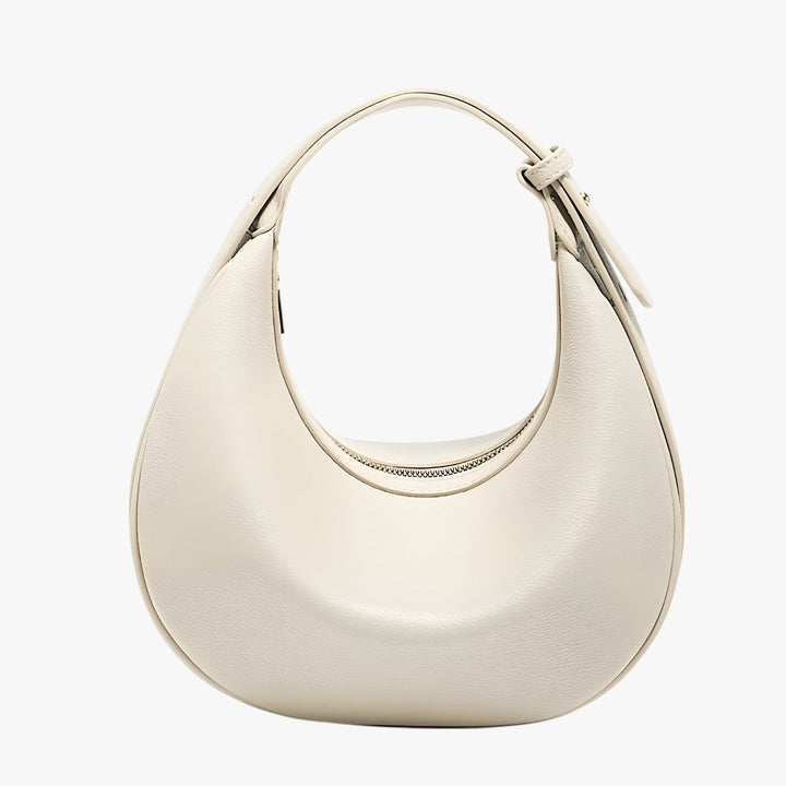 Dettaglio borsa hobo a mezzaluna da donna, design versatile ed elegante. Ideale per la moda.