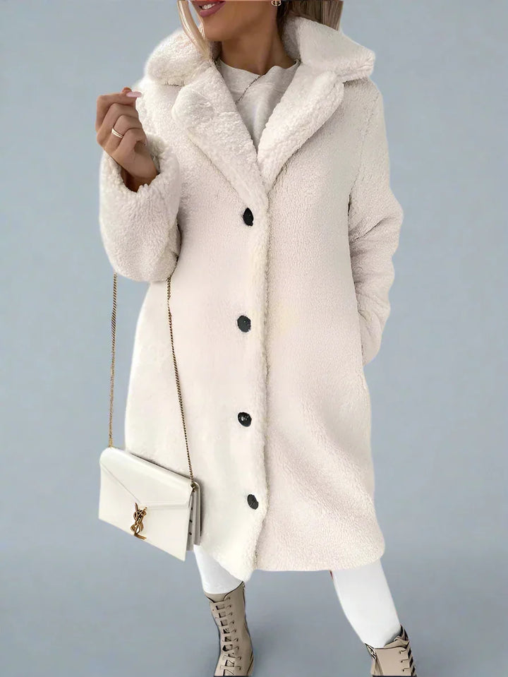 Cappotto lungo da donna elegante beige. Perfetto per outfit invernali, caldo e comodo.