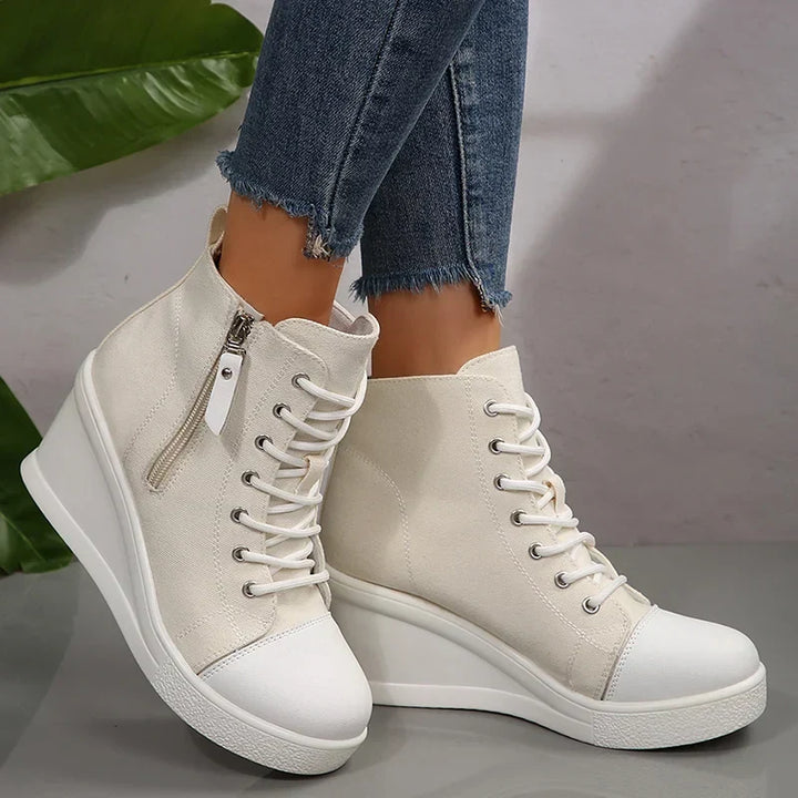 Cammina con stile! Sneakers donna con zeppa, zip e lacci, perfette per un look casual e comodo.