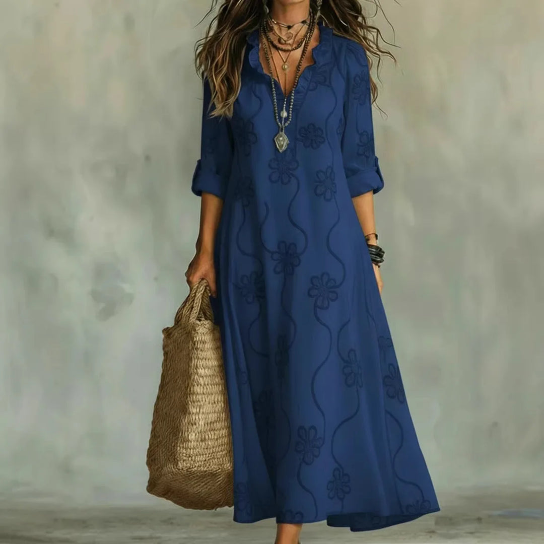 Abito estivo floreale da donna, leggero e versatile, per vacanze o moda casual.
