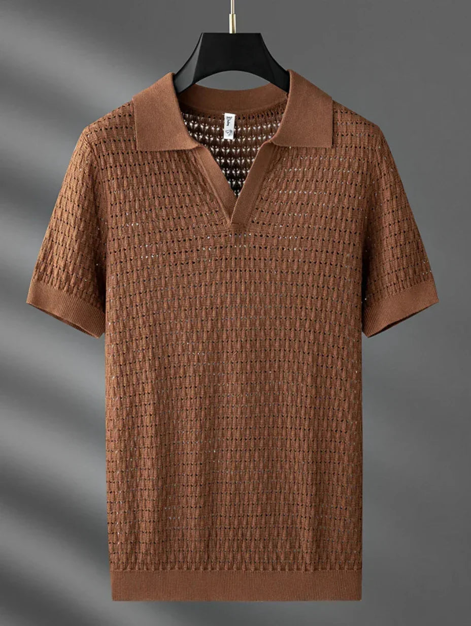 Polo uomo estiva traforata, maniche corte. Abbigliamento traspirante per freschezza e stile.
