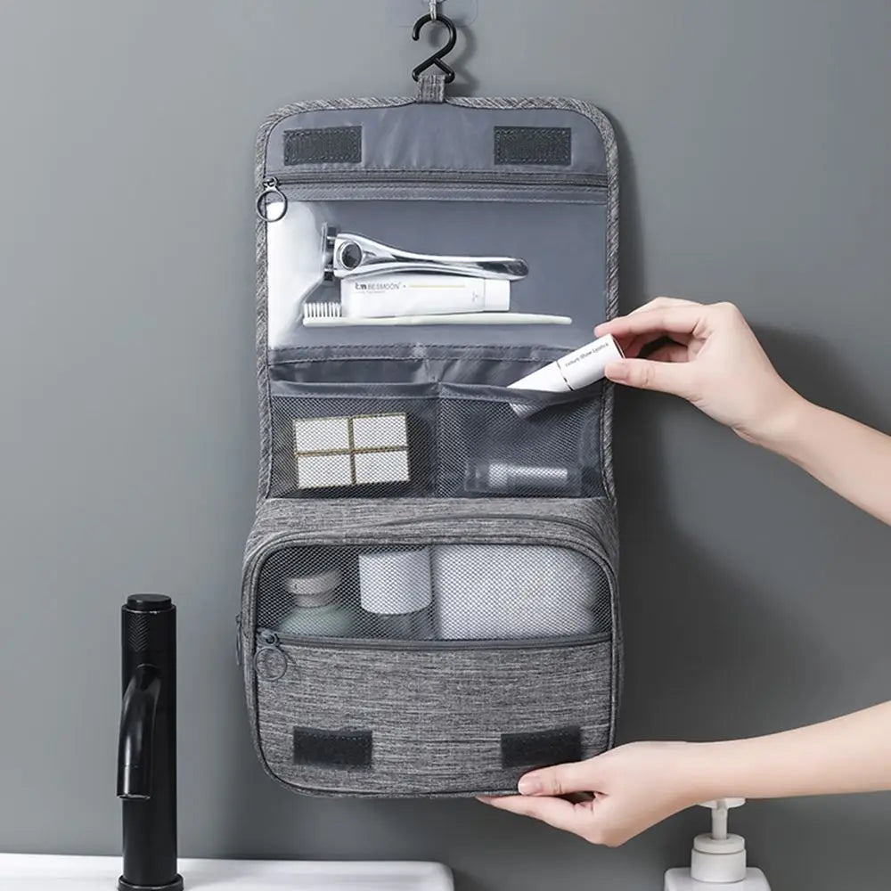 Beauty case da viaggio unisex pieghevole con gancio, ideale per organizzare cosmetici e toilette.