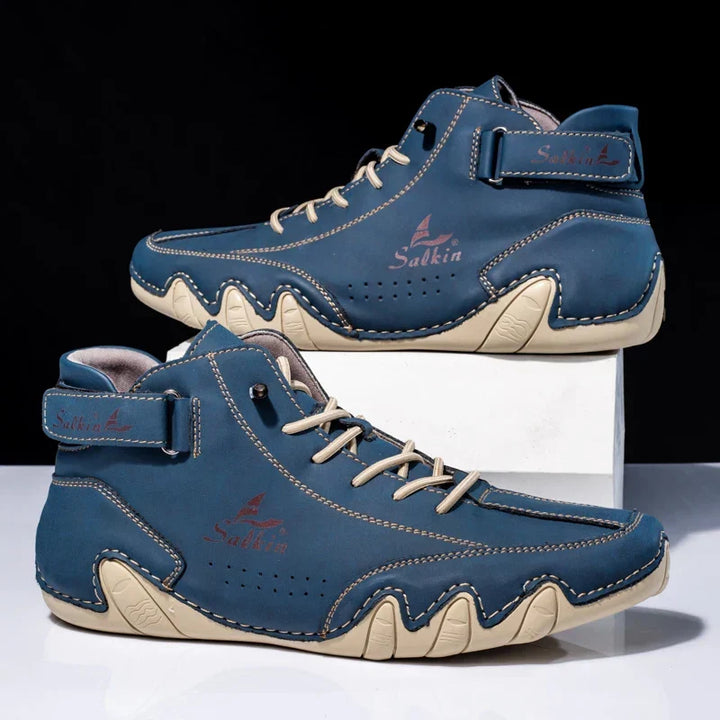 Calzature uomo High Top, suola ondulata per grip e stile. Ideali per il comfort quotidiano e look casual chic.