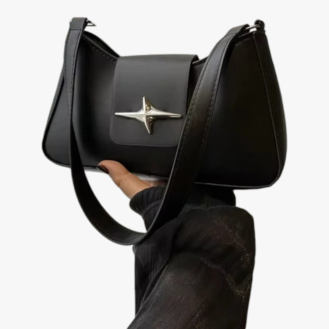 Borsa a spalla nera compatta da donna, accessorio elegante e versatile per ogni stile quotidiano.
