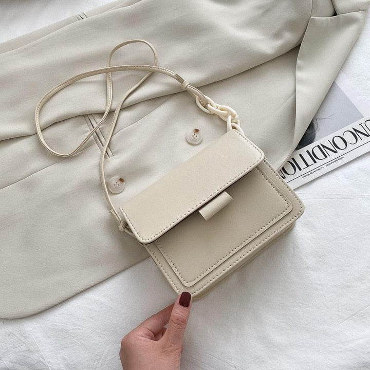 Borsa a tracolla sintetica multicolore per donna, ideale per un tocco di colore al tuo outfit.