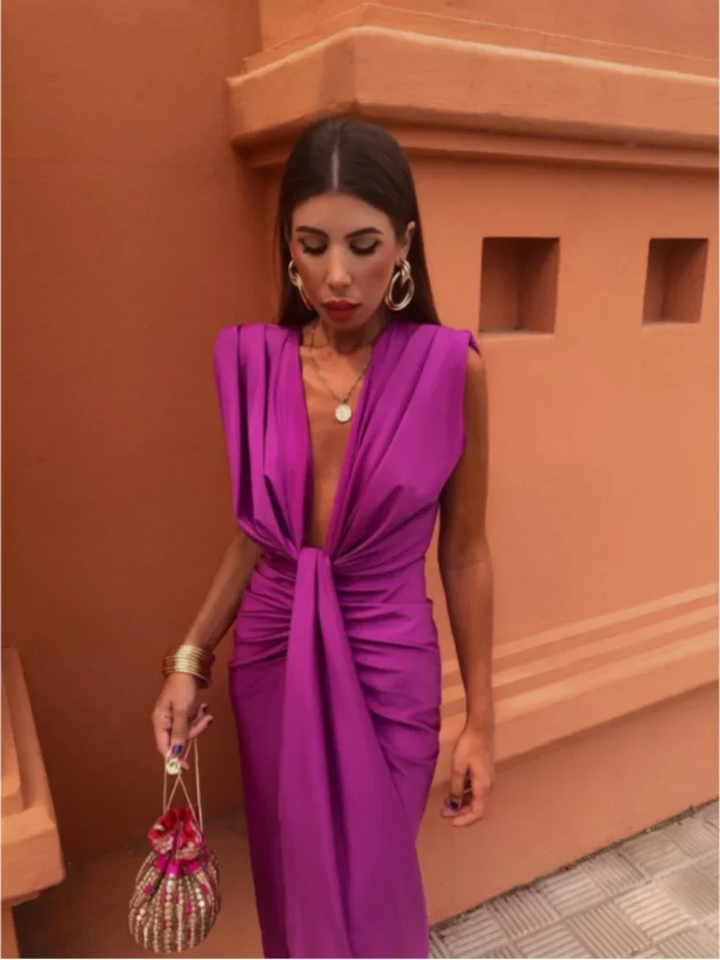 Abito da sera luminoso in raso per donna, con finitura satinata, ideale per serate chic.