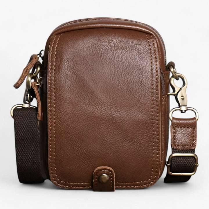 Borsa a tracolla verticale compatta unisex, ideale per viaggio e l'uso quotidiano. Un accessorio moda pratico.