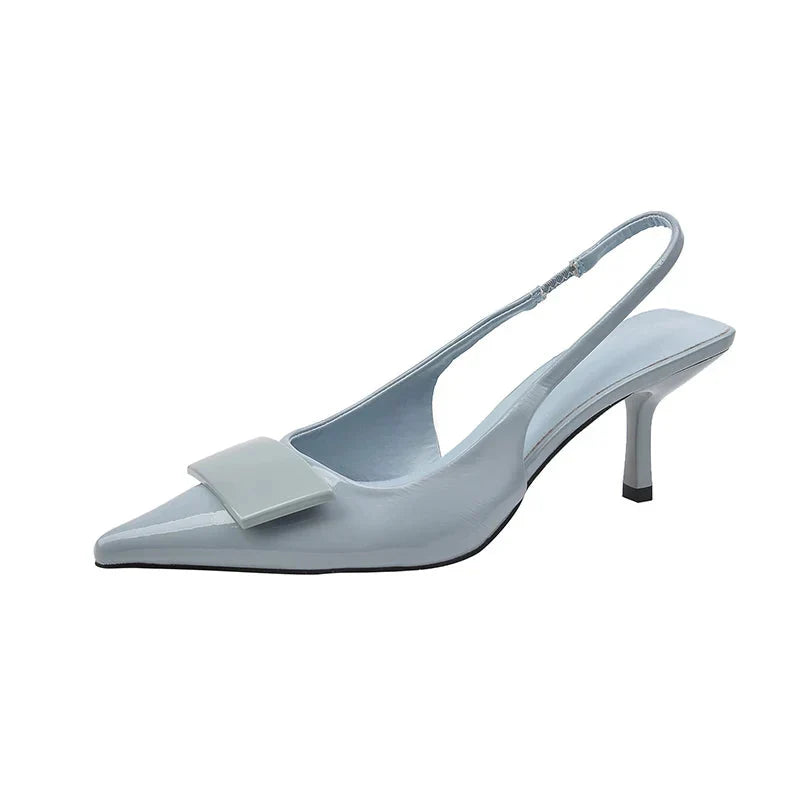 Slingback donna eleganti con tacco basso, stile versatile per l'ufficio e serate raffinate.