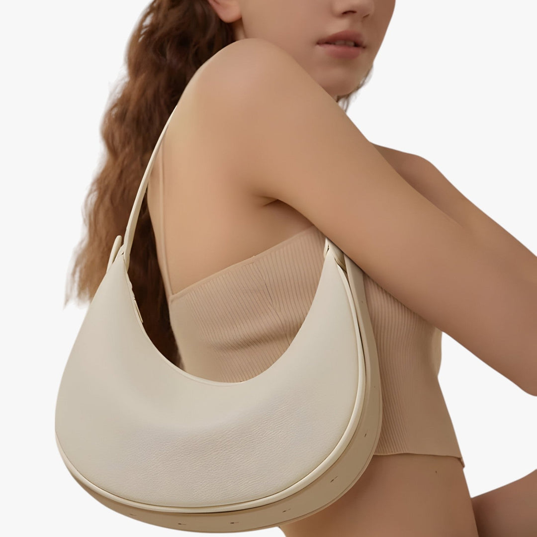 Borsa hobo a mezzaluna versatile per donna. Eleganza e funzionalità in un accessorio moda.