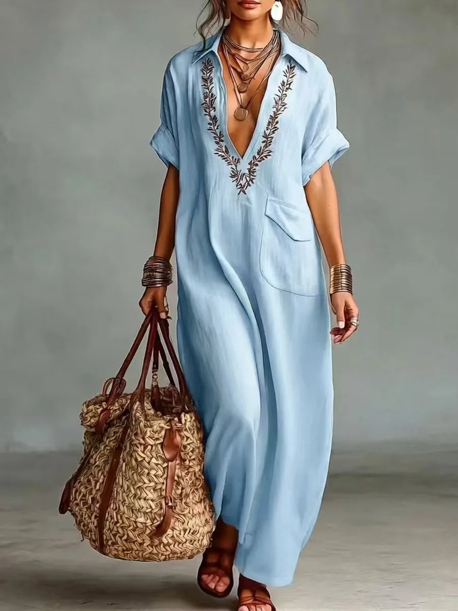 Abito lungo estivo fluido donna, stile boho casual, ideale per vacanze e tempo libero.