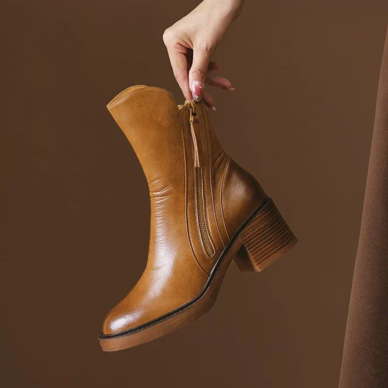 Stivaletti donna eleganti neri, tacco alto e suola antiscivolo, perfetti per look moda autunno/inverno.