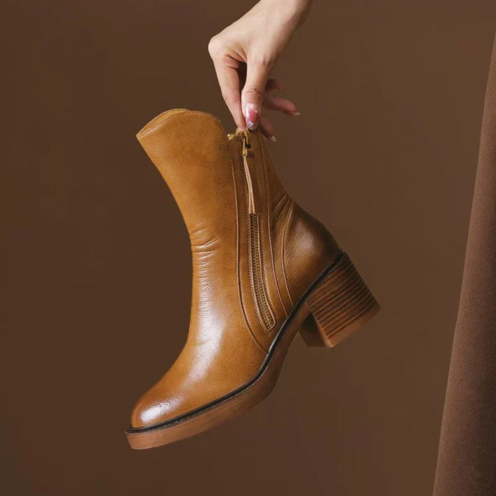 Stivaletti donna eleganti neri, tacco alto e suola antiscivolo, perfetti per look moda autunno/inverno.