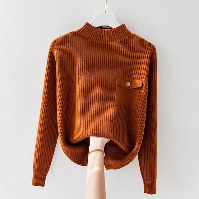 Maglione donna in maglia a coste, collo alto, ideale per abbigliamento casual e un tocco di eleganza invernale.