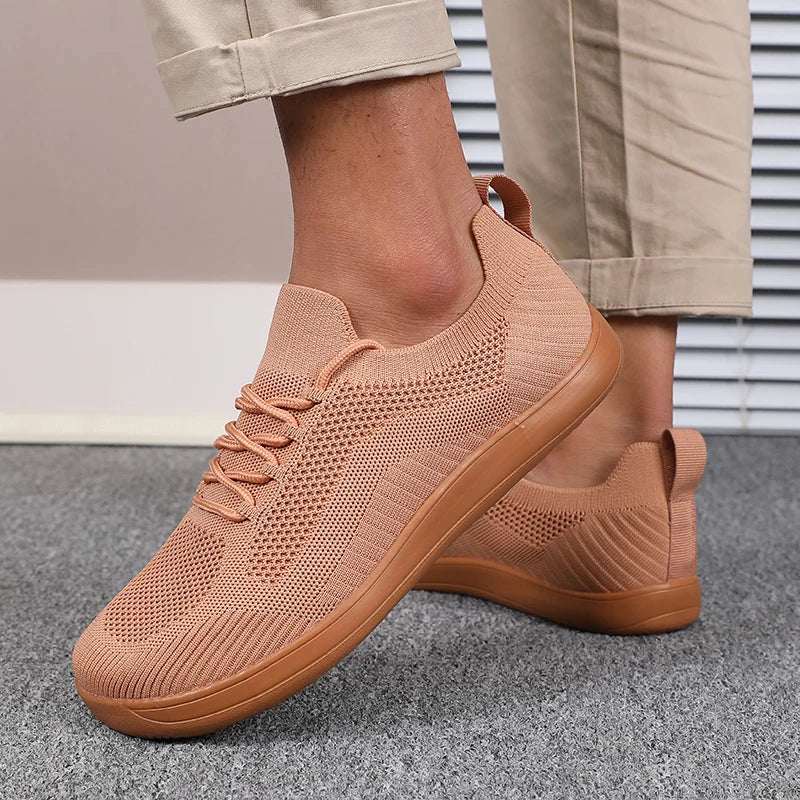 Versatili sneakers uomo traspiranti. Scarpe leggere con suola ammortizzata, perfette per ogni occasione.