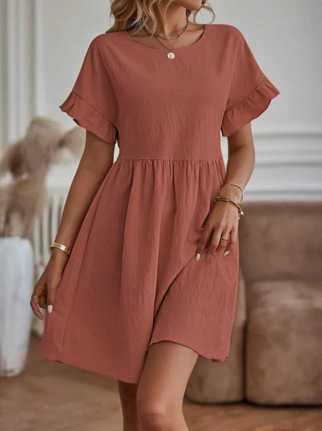 Vestito estivo donna, mini abito con scollo tondo. Eleganza quotidiana, stile fresco per primavera-estate.