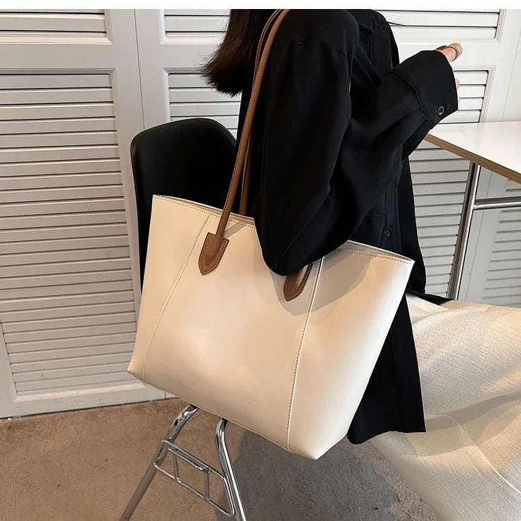 Tote bag donna in ecopelle, borsa grande ed elegante per un look quotidiano e professionale.