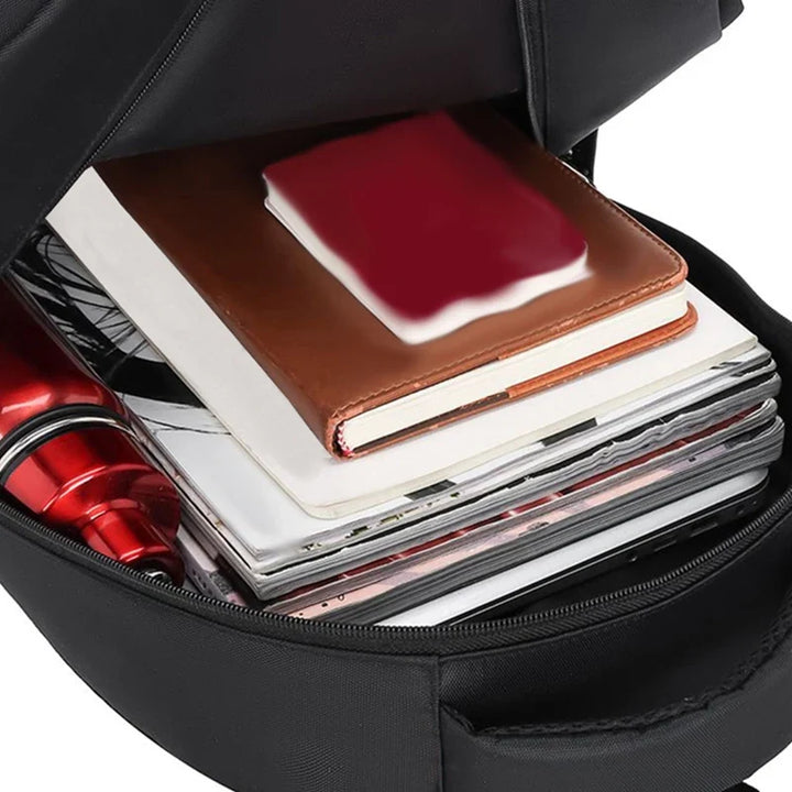 Zaino da scuola in nylon unisex, impermeabile con tasche per laptop e borraccia. Ideale per ogni condizione meteo.