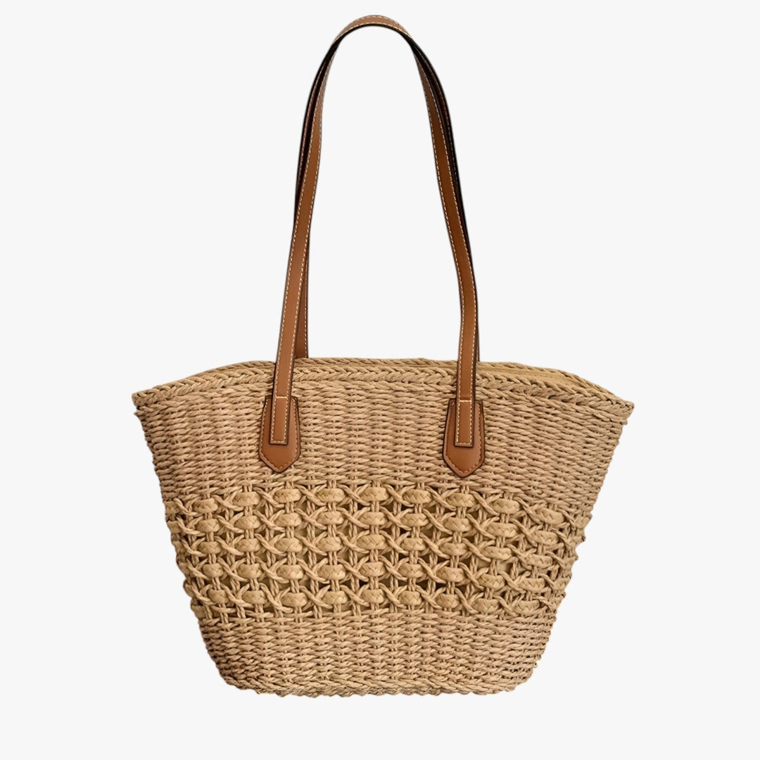 Borsa da donna in paglia, tote versatile con dettagli artigianali per un'estate elegante.