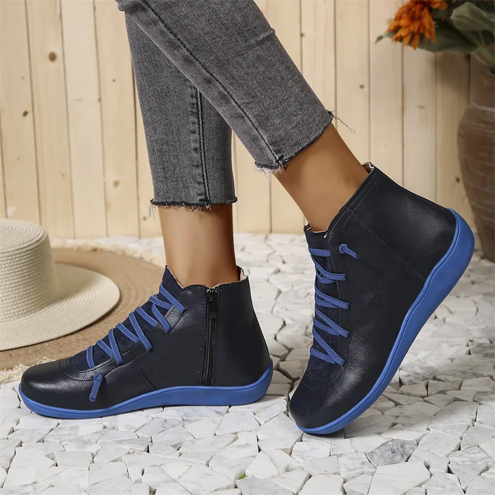 Stivaletti donna con lacci, ortopedici e impermeabili, offrono supporto plantare e comfort per piedi sensibili.