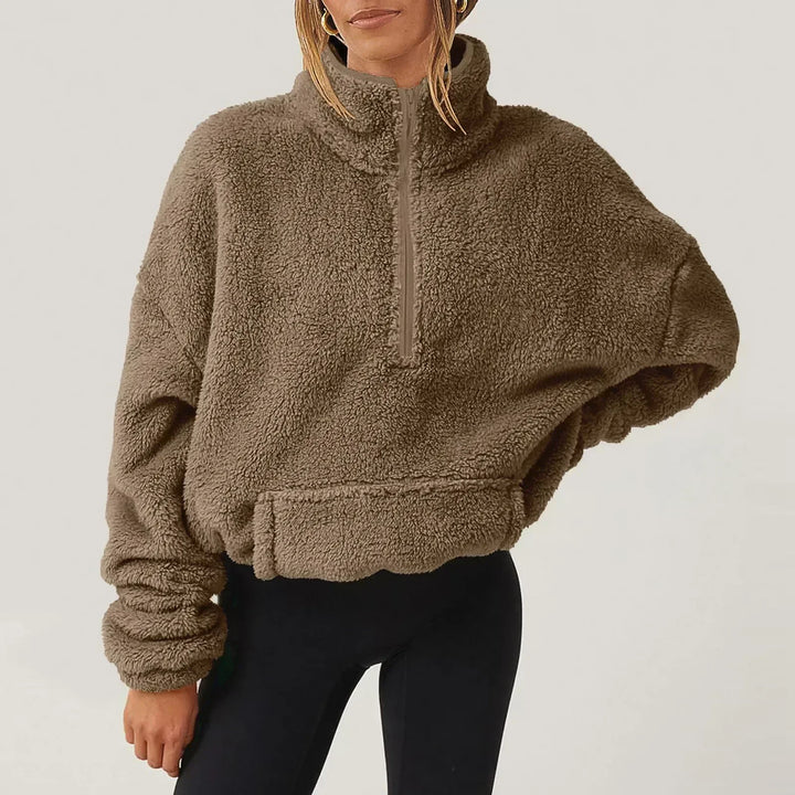 Maglione donna in stile casual con mezza zip e colletto, perfetto per l'abbigliamento quotidiano e comfort.