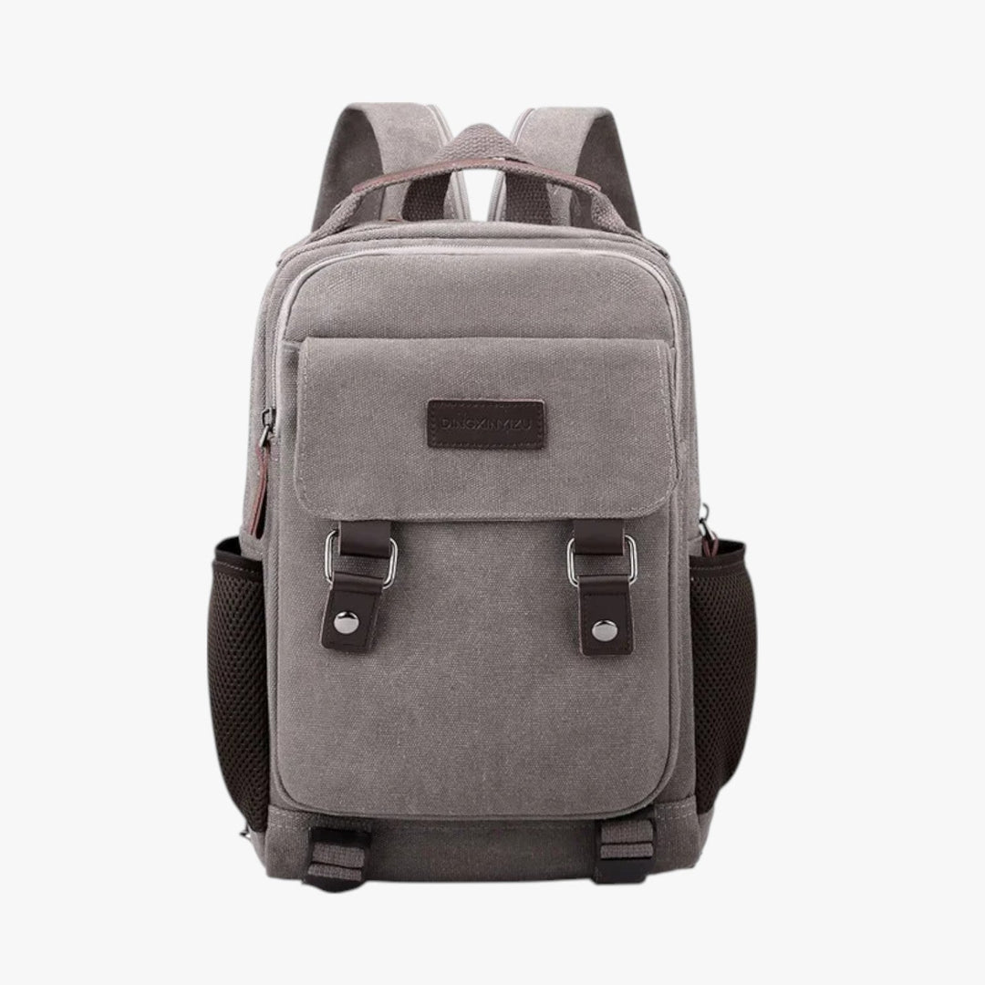 Mini zaino da uomo in tela multicolore, stile compatto per viaggio e uso quotidiano.