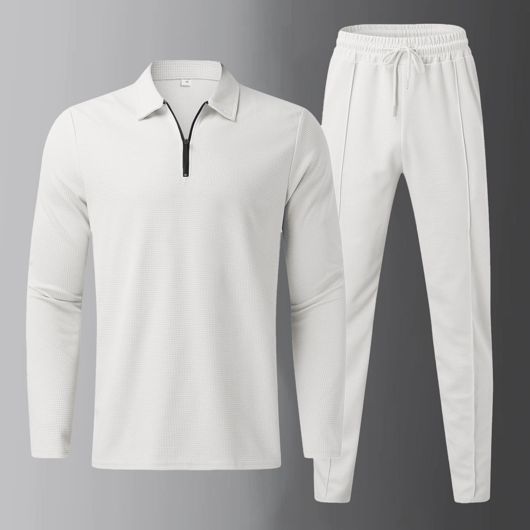 Set coordinato uomo in beige con polo a maniche lunghe e pantaloni jogger per stile casual.