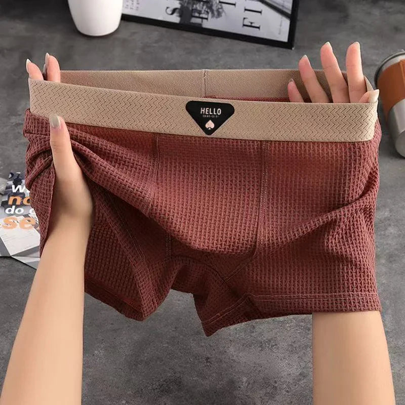 Intimo uomo: boxer traspiranti in poliestere elastan, confezione da 4 per massimo comfort.