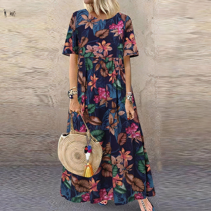 Abito maxi floreale casual per donna, stile comodo per primavera/estate. Vestito elegante e rilassato.
