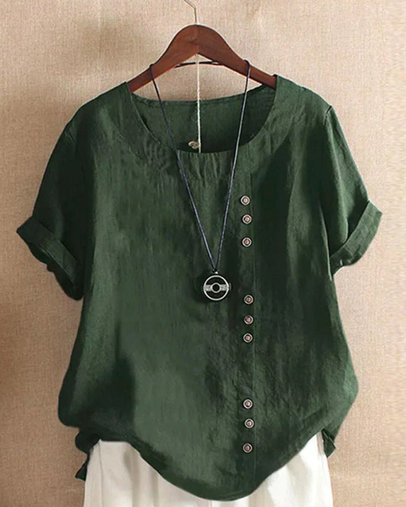 Blusa versatile da donna, maniche corte e bottoni. Perfetta per un look casual o semi-formale.