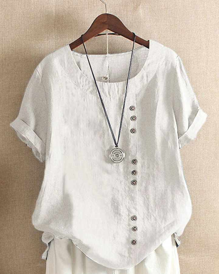 Blusa casual donna con bottoni frontali e maniche corte. Ideale per look primaverili.