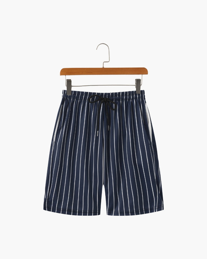 Pantaloncini da bagno uomo a righe con coulisse, per comfort e stile in spiaggia. Perfetti per le vacanze estive.