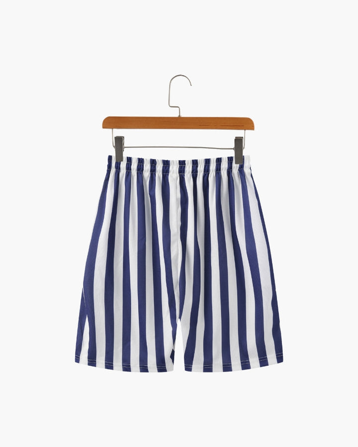 Pantaloncini da bagno uomo a righe con coulisse regolabile, per una vestibilità perfetta in spiaggia e piscina.