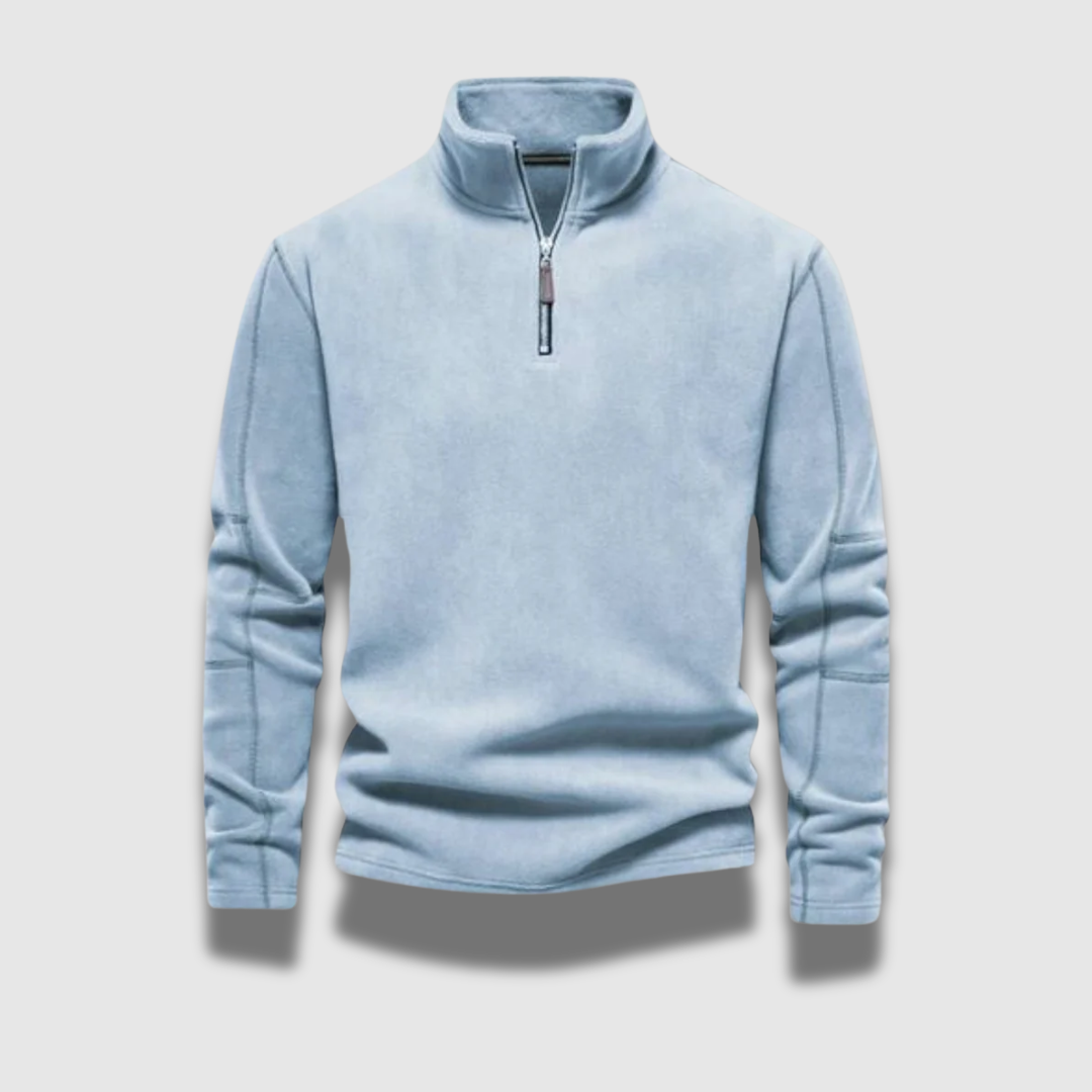Uomo con maglione invernale caldo e confortevole, stile moderno per affrontare il freddo con eleganza.