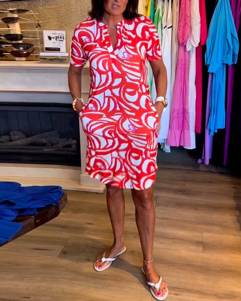 Abito estivo donna midi stampato con scollo a V, perfetto per look casual e vacanze alla moda.